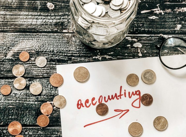 Accounting euro coins on table