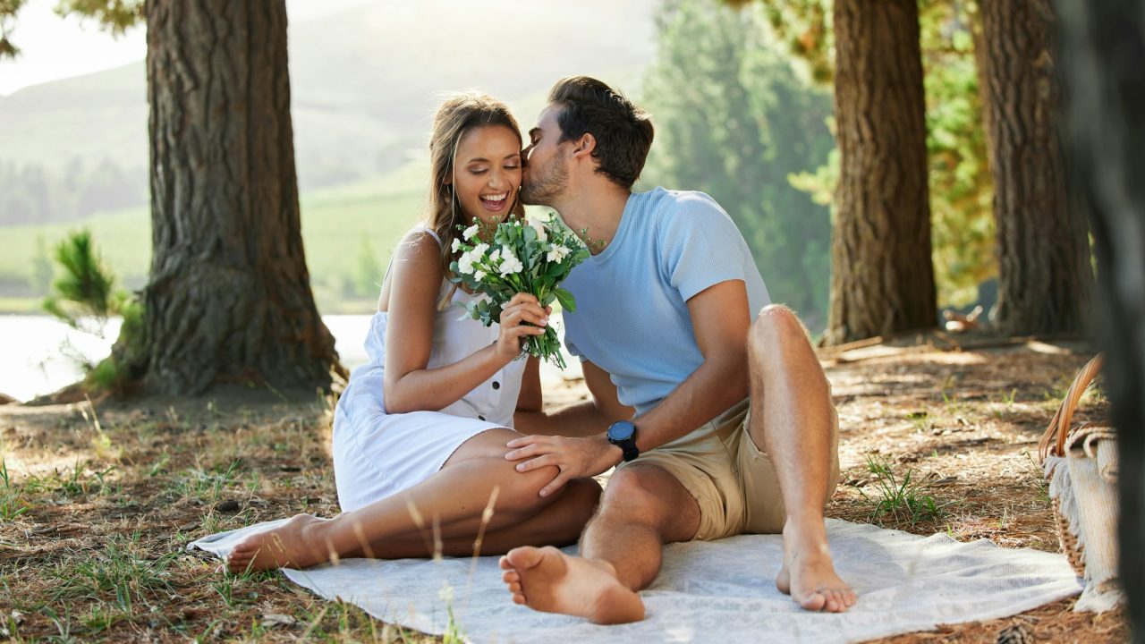 You deserve it and so much more. Shot of a young couple on a romantic date in the forest.