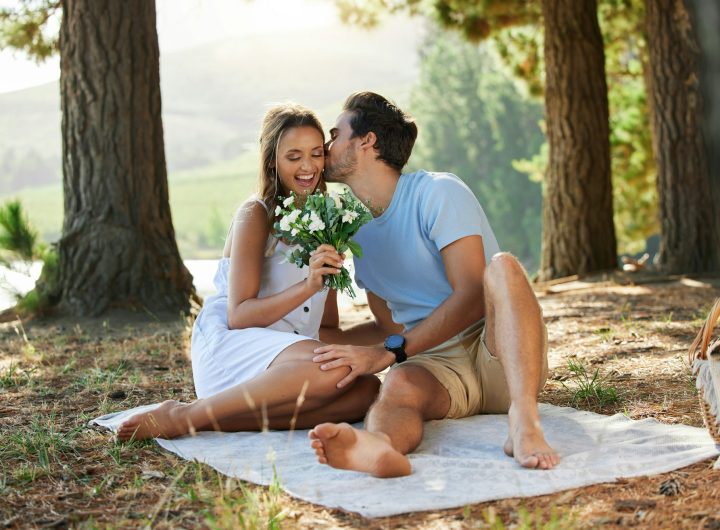 You deserve it and so much more. Shot of a young couple on a romantic date in the forest.