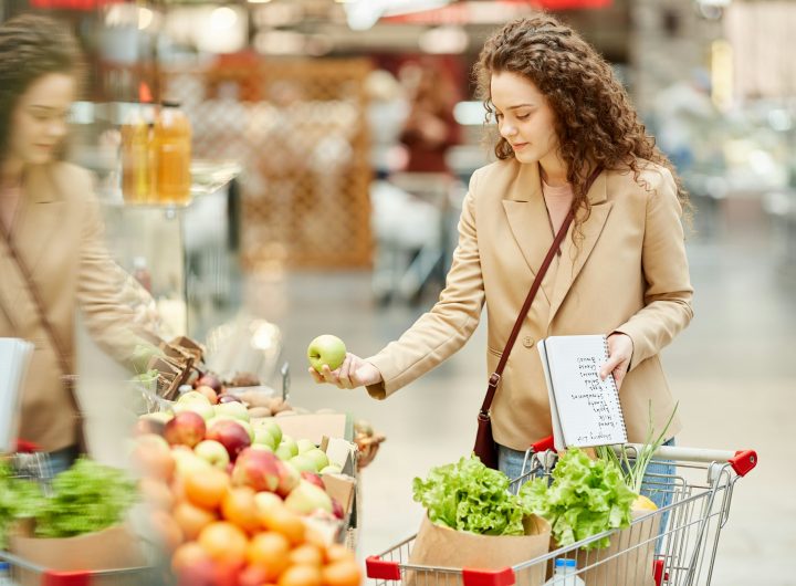 Young Woman Enjoying Grocery Shopping